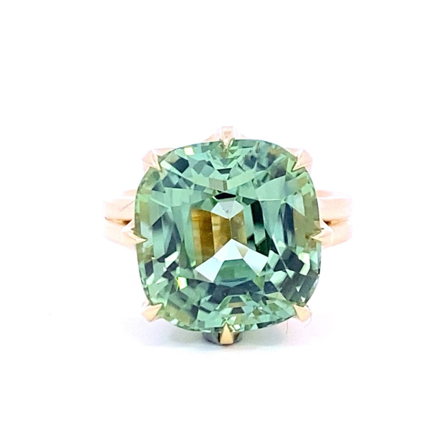 Mint apple green tourmaline cocktail ring set with a cross hatched diamond basket view from front