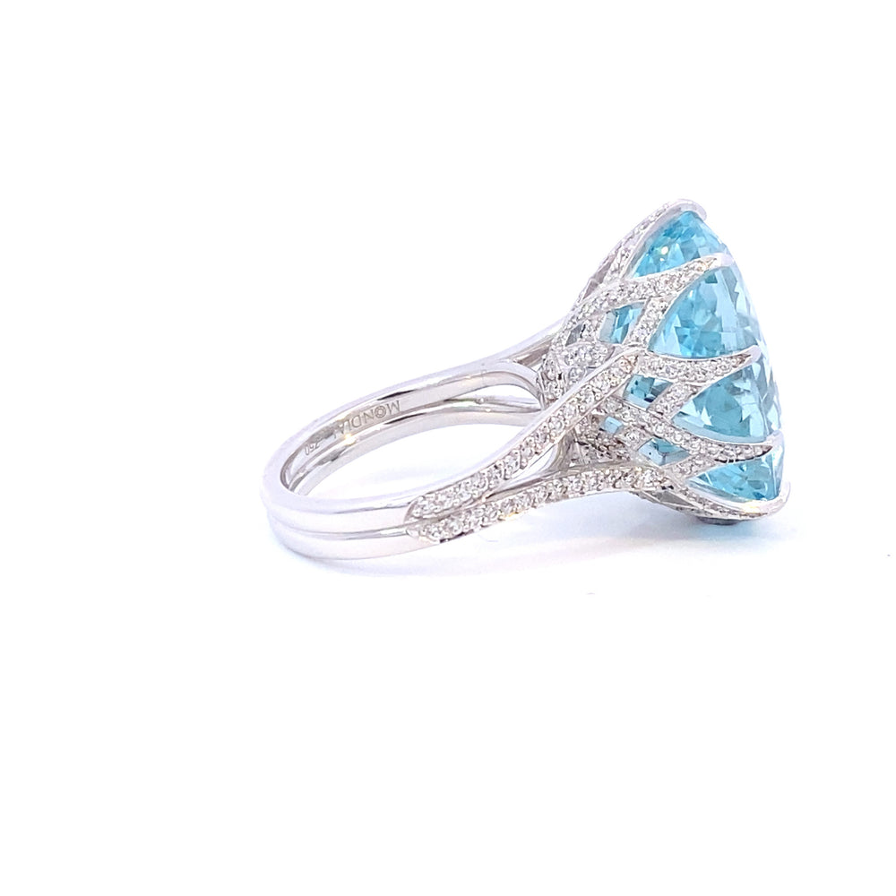 Aquamarine cocktail ring set with a cross hatched diamond basket view from side 