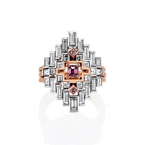 Lumiere Collection multi piece ring with white diamonds and pink sapphires displayed on a high white background with a reflection shadow on the ring in the foreground.