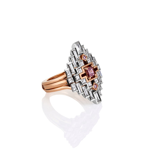 Lumiere Collection multi piece ring with white diamonds and pink sapphires displayed showing the side and band. Photographed on a white background with a reflection shadow on the ring in the foreground.