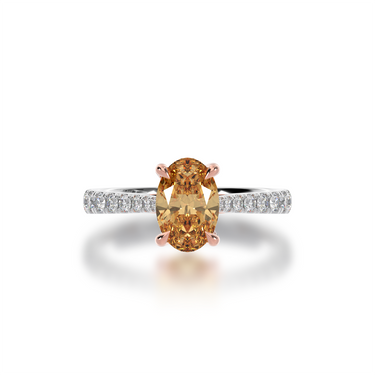 Front view of the Mondial by Nadia oval cut diamond ring with Champagne Diamond on a diamond set band.