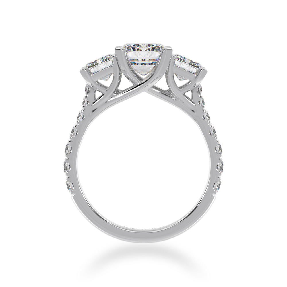 Emerald cut diamond trilogy ring with a diamond set band from front