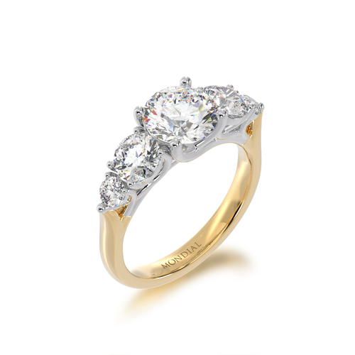 5 stone round brilliant cut diamond ring on a yellow gold band