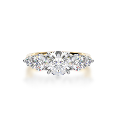 5 stone round brilliant cut diamond ring on a yellow gold band