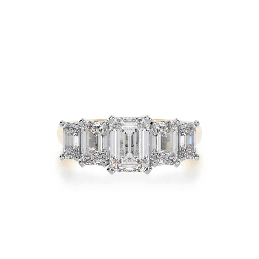 Five stone emerald cut diamond ring on yellow gold band
