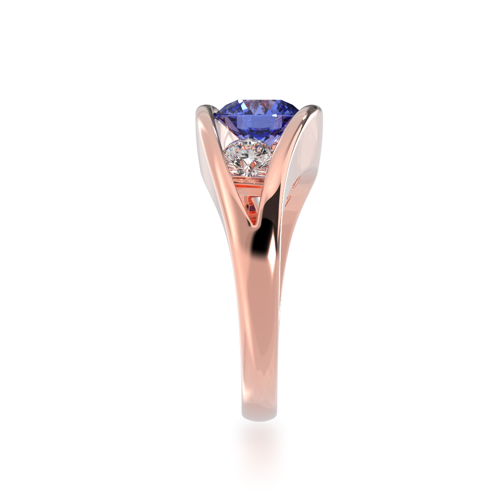 Flame design round brilliant cut blue sapphire and diamond ring in rose gold view from side 
