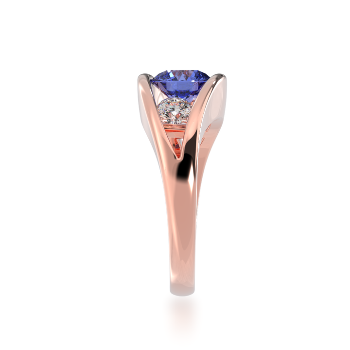 Flame design round brilliant cut blue sapphire and diamond ring in rose gold view from side 
