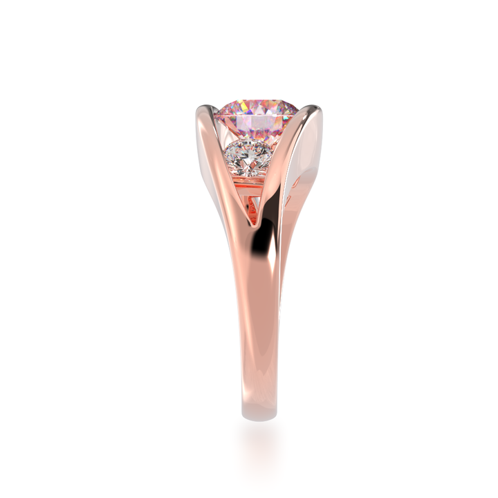 Flame design round brilliant cut pink sapphire and diamond ring in rose gold view from side 