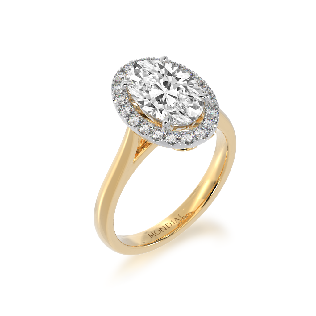 Oval diamond halo on yellow gold band from angle
