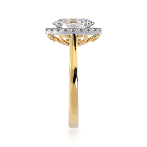 Oval diamond halo on yellow gold band from side standing view.