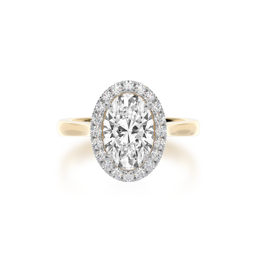 The Mondial by Nadia Oval diamond ring with halo on yellow gold band from top.