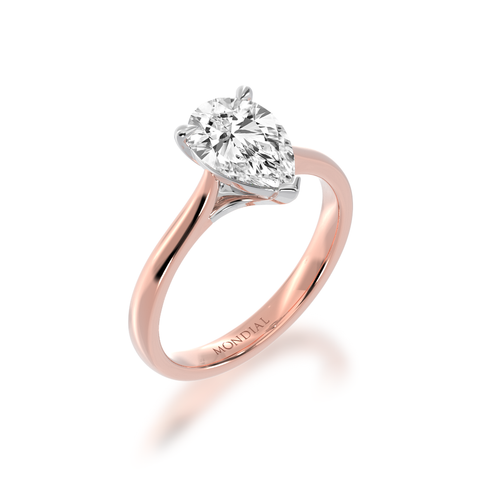 Pear shaped diamond solitaire engagement ring on rose gold band view from angle