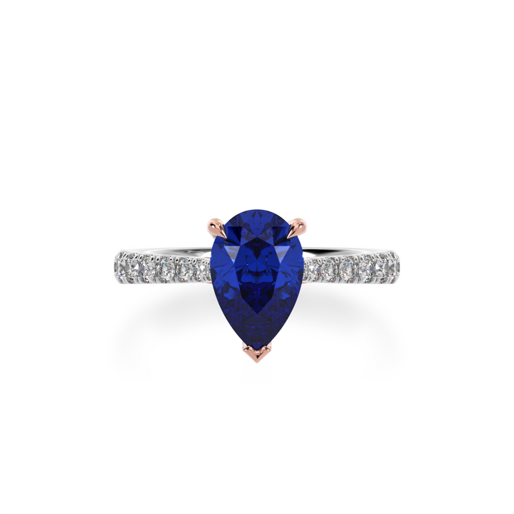 Pear shaped blue sapphire solitaire ring with diamond set band view from top