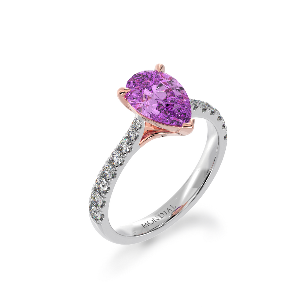 Pear shaped pink sapphire solitaire engagement ring with diamond set band view from angle 