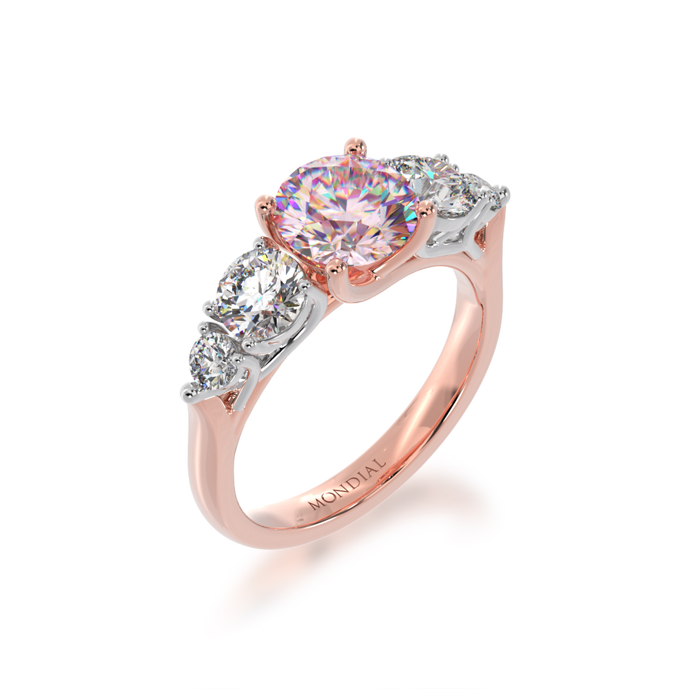 5 stone brilliant cut Pink Sapphire and diamon ring from angle