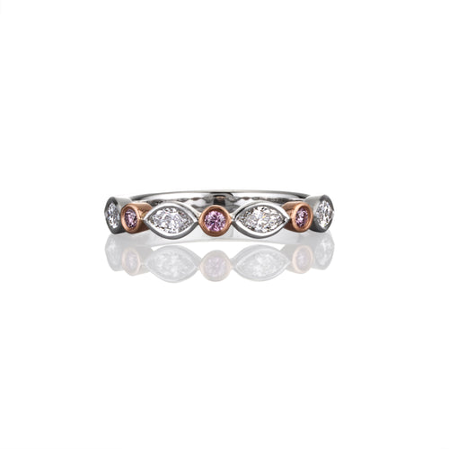 Argyle Pink Diamonds interwoven with white diamonds in a platinum and rose gold ring