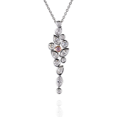 Platinum necklace with a leaf-shaped pendant on a white background