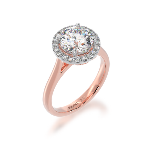 Round brilliant cut diamond halo on a rose gold band side angle