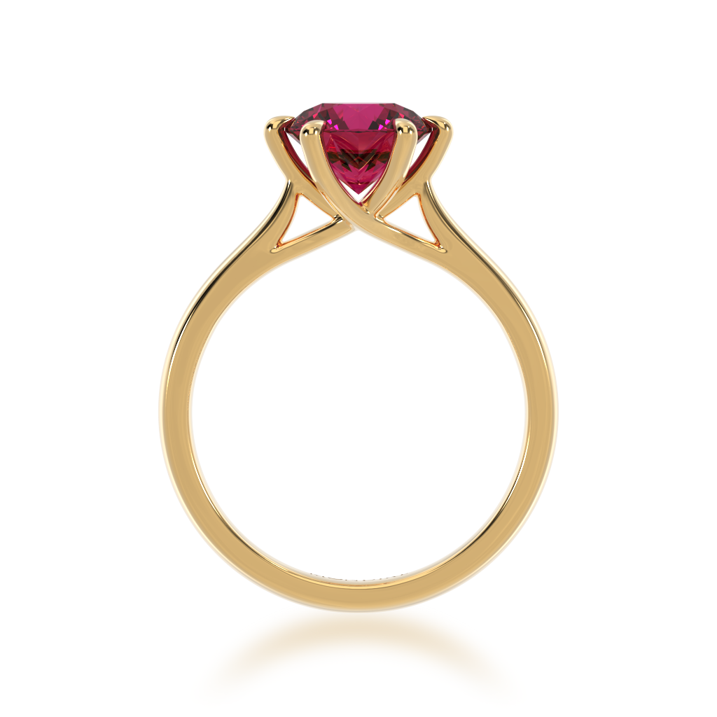 Brilliant cut ruby solitaire on a yellow gold band from front
