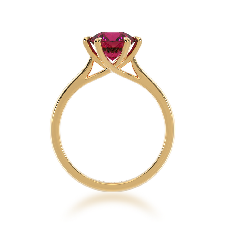 Brilliant cut ruby solitaire on a yellow gold band from front