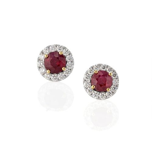 Pair of stud earrings with ruby gemstones and gold accents
