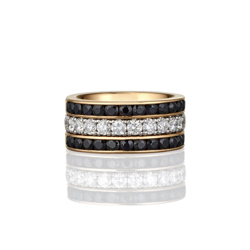 Multi-layered ring with black sapphires and white diamonds