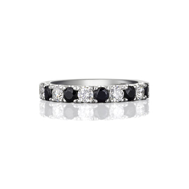 White Gold ring with black sapphires and white diamonds  on a white background