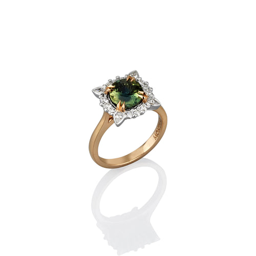 Sapphire Green central stone surrounded by white diamonds to form a square shape. Yellow Gold band