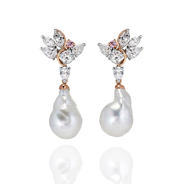 A pair of south sea pearl drop earrings with white gold diamonds and pink sapphire