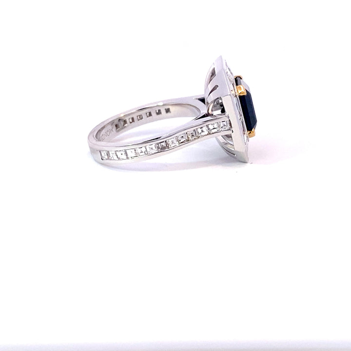 Square step cut black sapphire diamond halo ring with diamond band