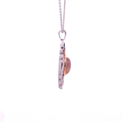 Moon stone and baguette diamond pendant