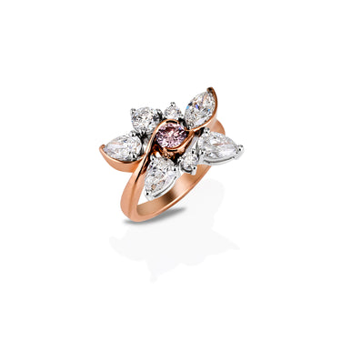 Argyle Pink and White Diamond Ring on a slant showing the deep band and gemstone face