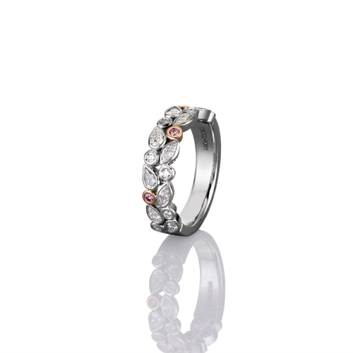 Argyle pink diamond and white diamond ring in platinum