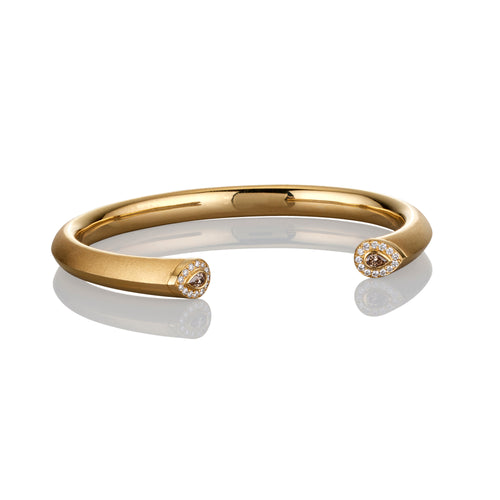 Yellow Gold Cuff Bracelet finished with white and argyle pink diamonds at the cuff ends.