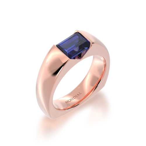 The Mondial by Nadia Embrace baguette cut blue sapphire engagement ring in rose gold view from angle.