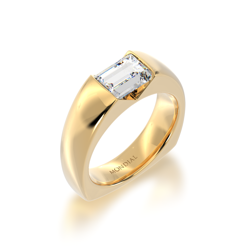 Baguette cut diamond in yellow gold 'embrace' design ring view from angle.