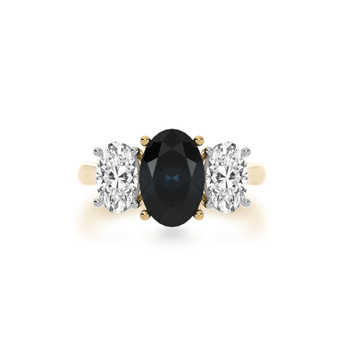 The Mondial by Nadia Trilogy oval diamond ring with a black sapphire on yellow gold band view from top.