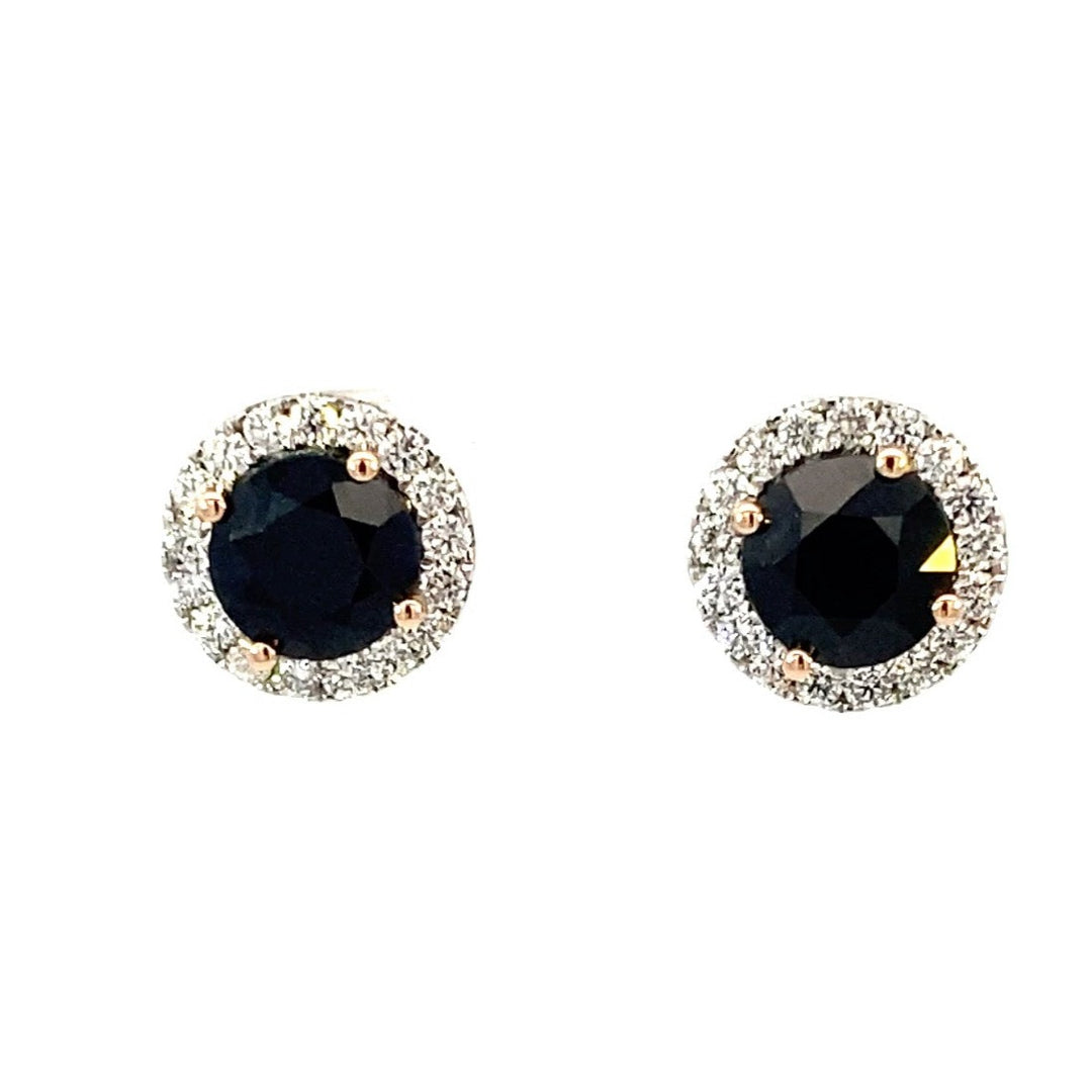 Black sapphire diamond halo earrings.