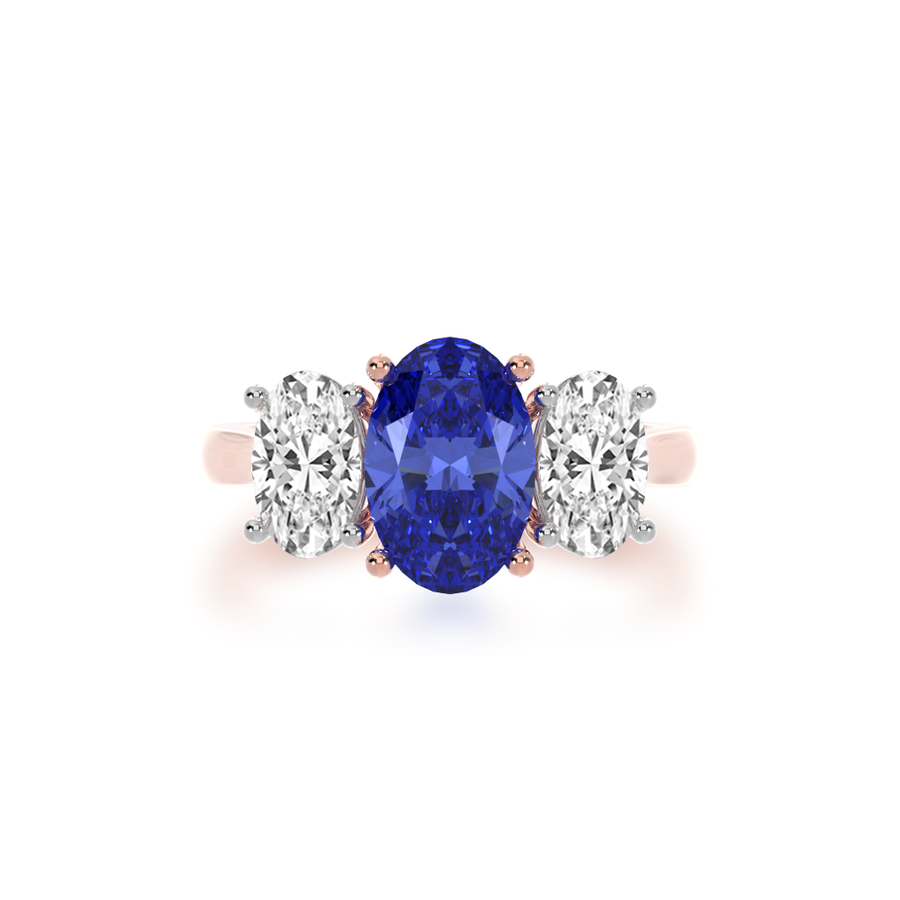 Trilogy oval cut blue sapphire and diamond ring on rose gold band view from top