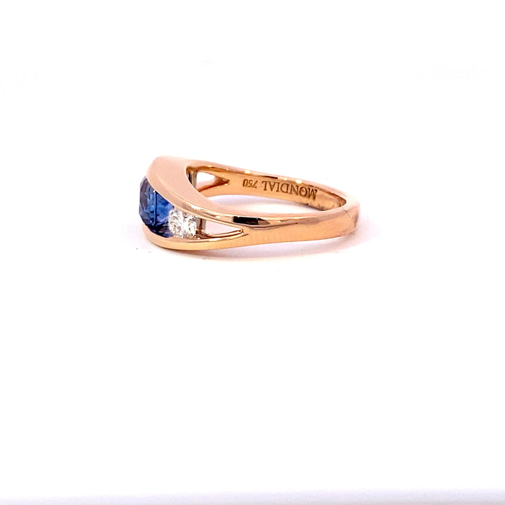 Flame design blue Ceylon sapphire and diamond ring