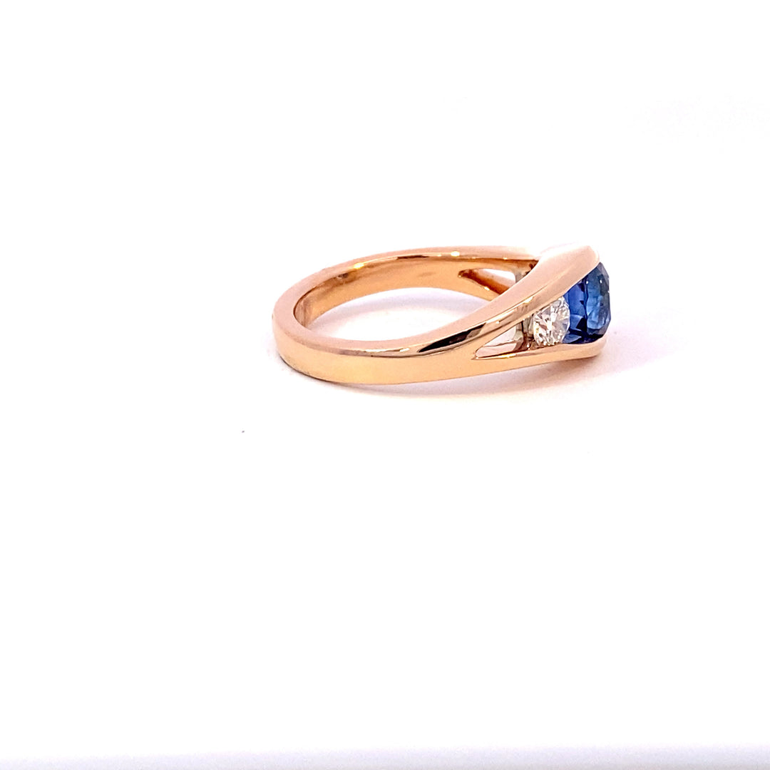 Flame design blue Ceylon sapphire and diamond ring