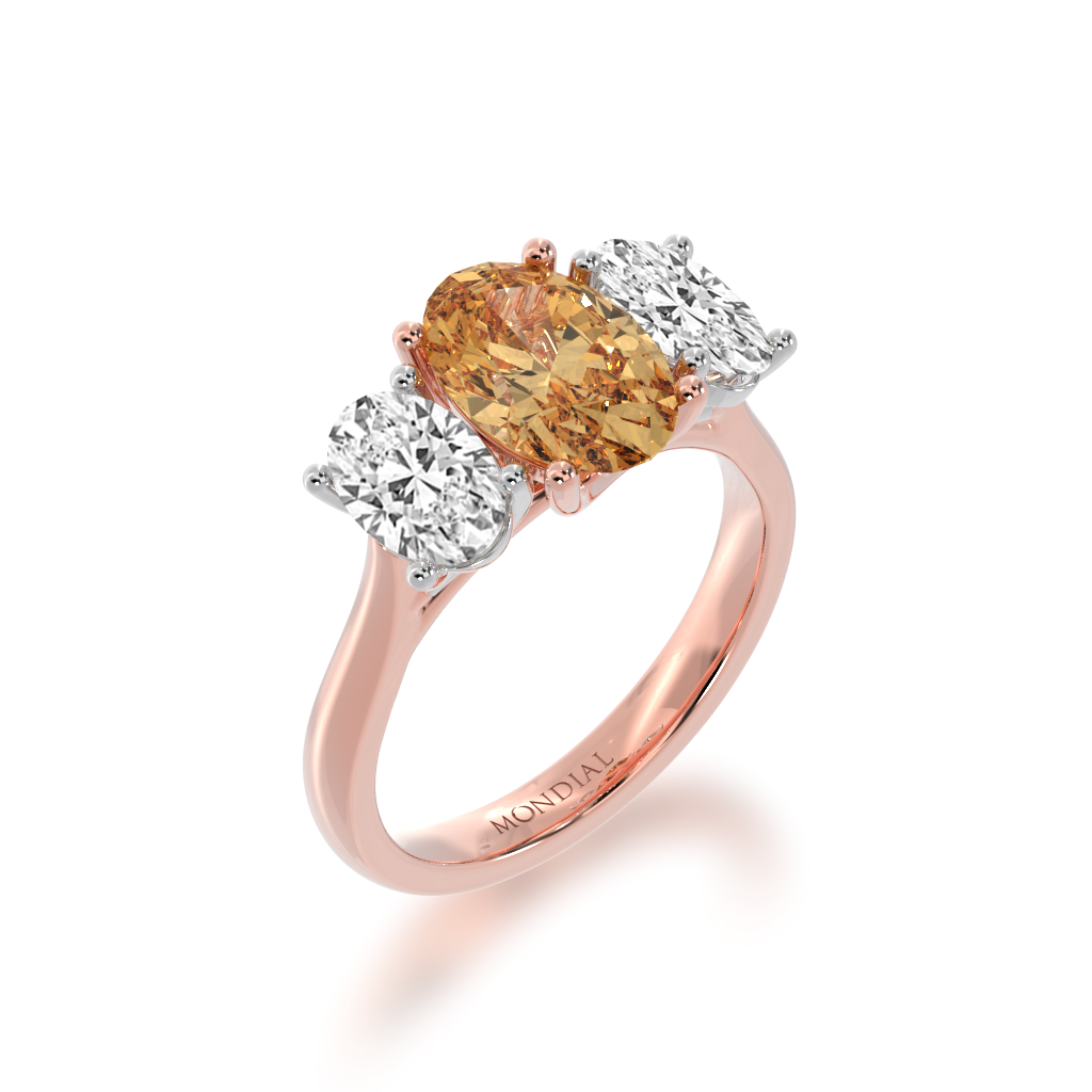 Trilogy oval champagne diamond and oval diamond ring on rose gold band view from angle 