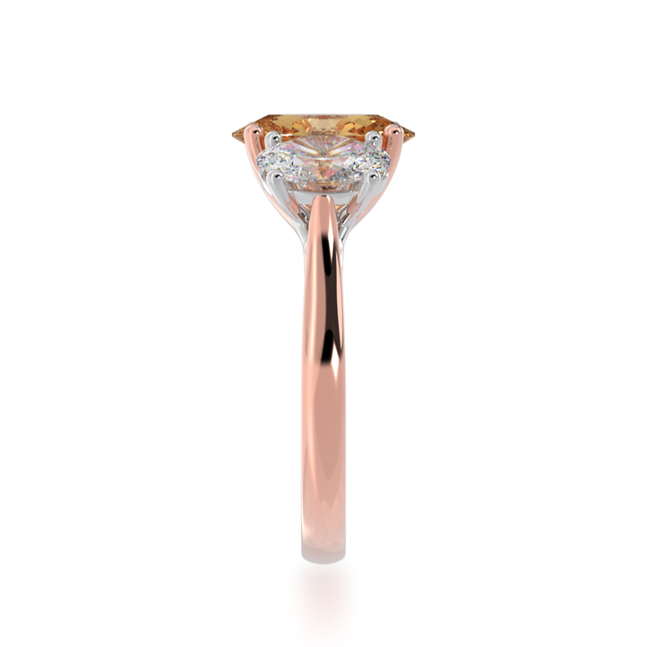 Trilogy oval cut champagne and diamond ring on rose gold band view from side 