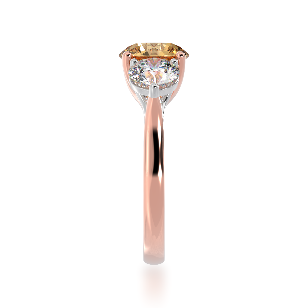 Trilogy round brilliant cut champagne and diamond ring on rose gold band view from side 