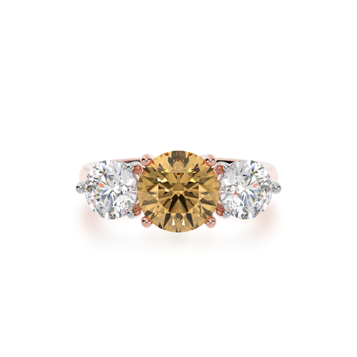 Trilogy round brilliant cut champagne and diamond ring on rose gold band view from top