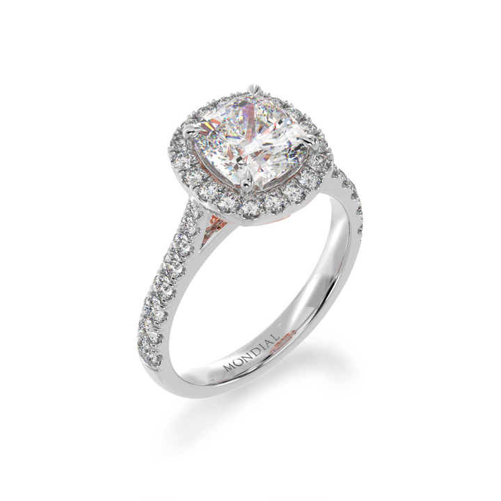 Cushion cut diamond Halo engagement ring with diamond set band view from angle 