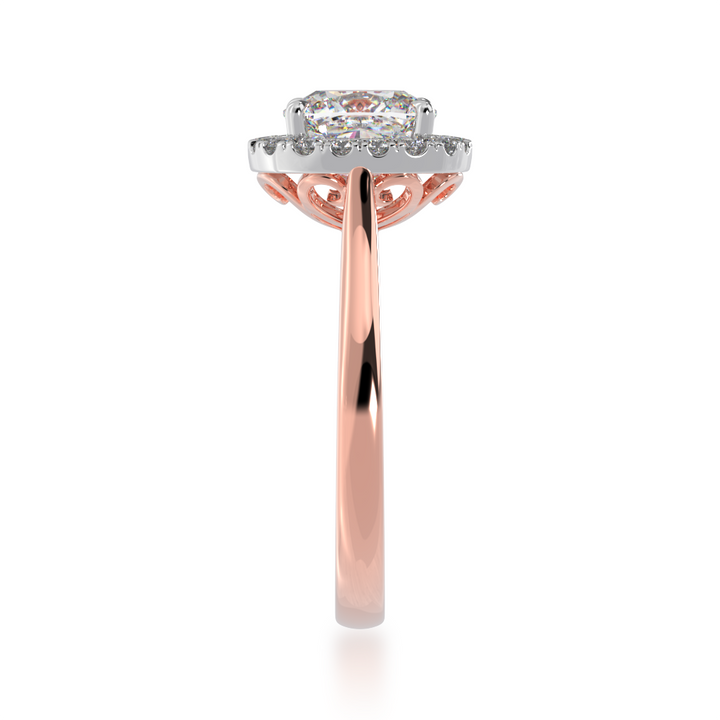 Cushion cut diamond halo ring on a rose gold band view from side