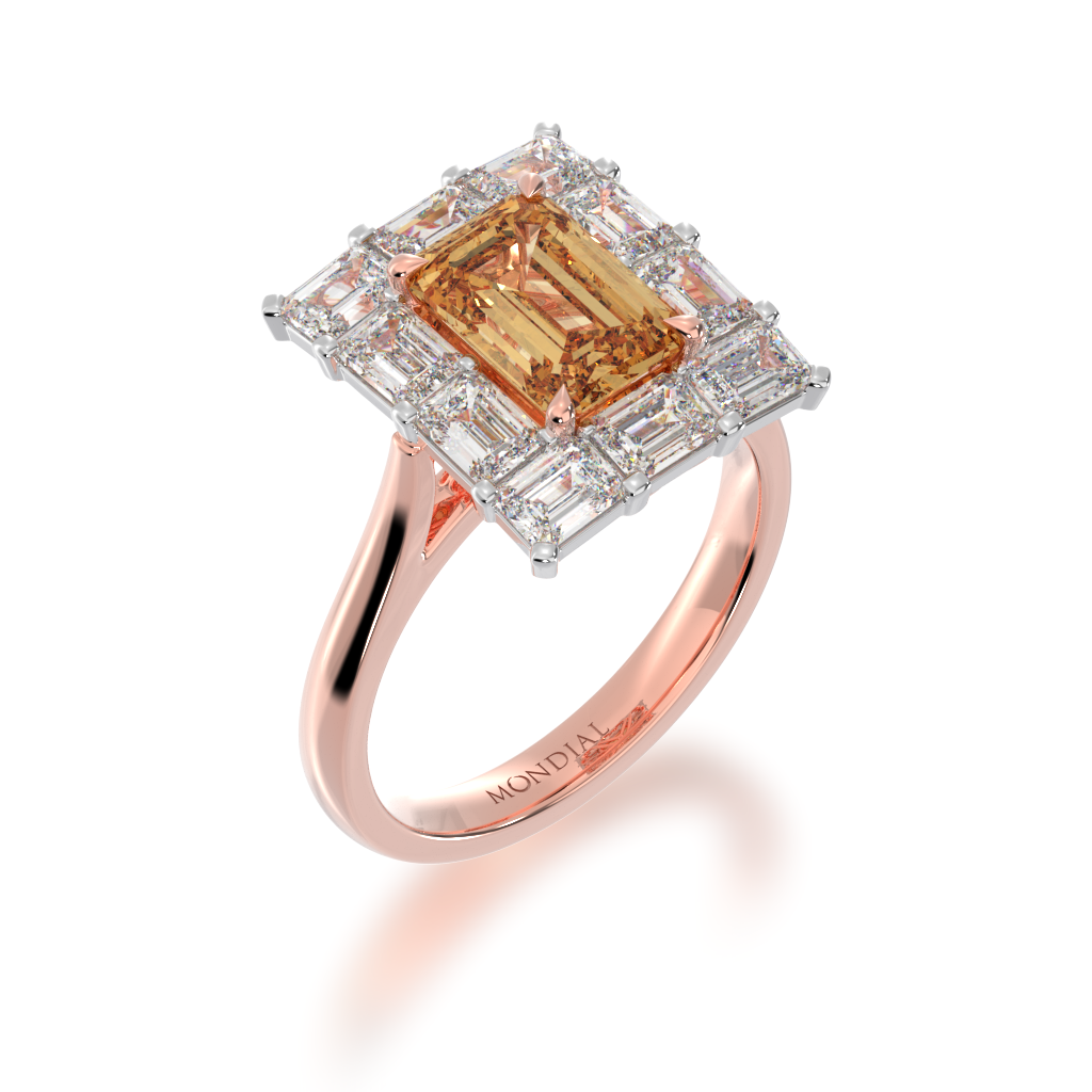 Baguette cut ruby in yellow gold 'embrace' design ring view from angle 