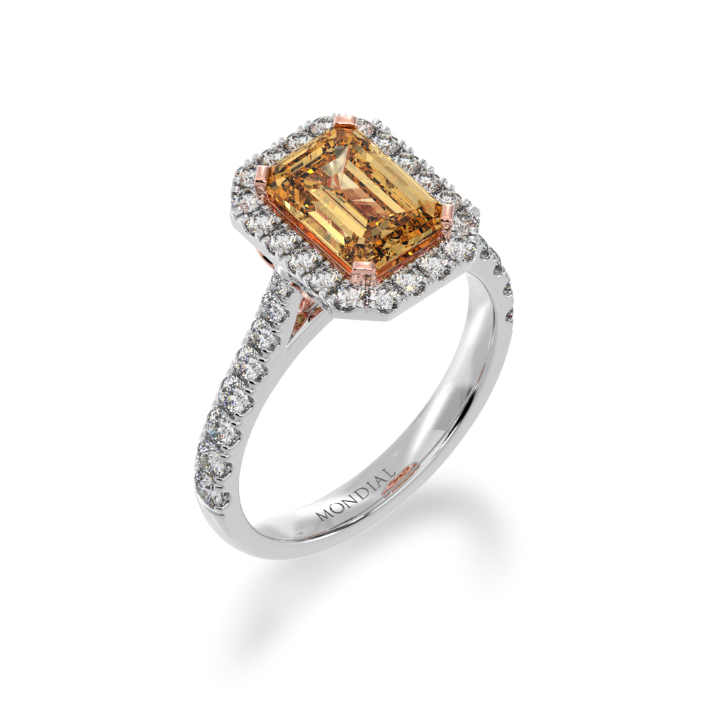 Emerald cut champagne diamond halo ring with diamond set band view from angle