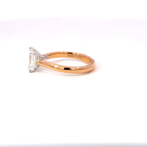 Emerald cut diamond solitaire ring on rose gold band